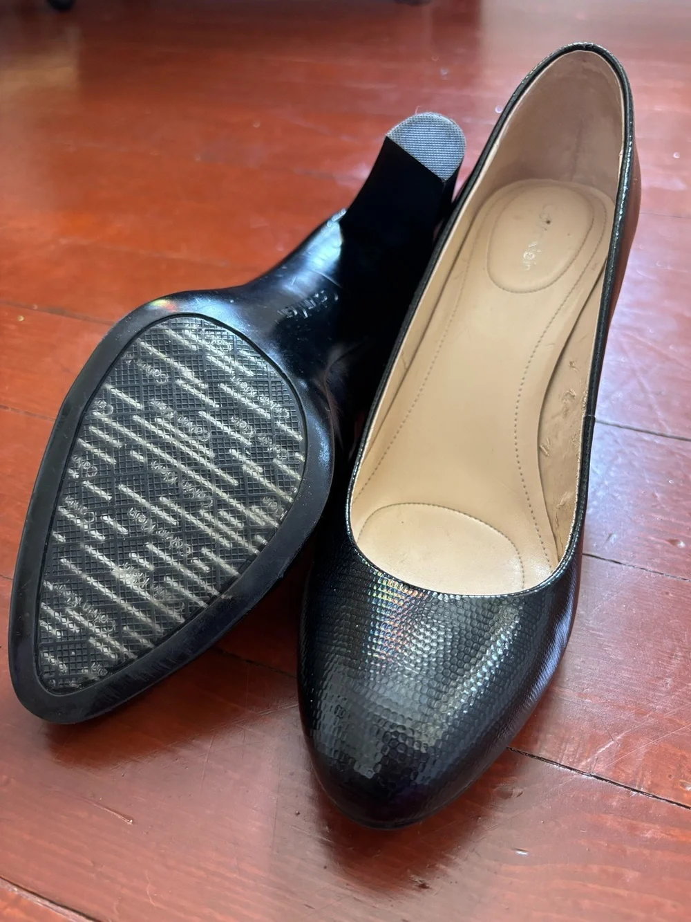 CK Women’s faux snake skin pumps